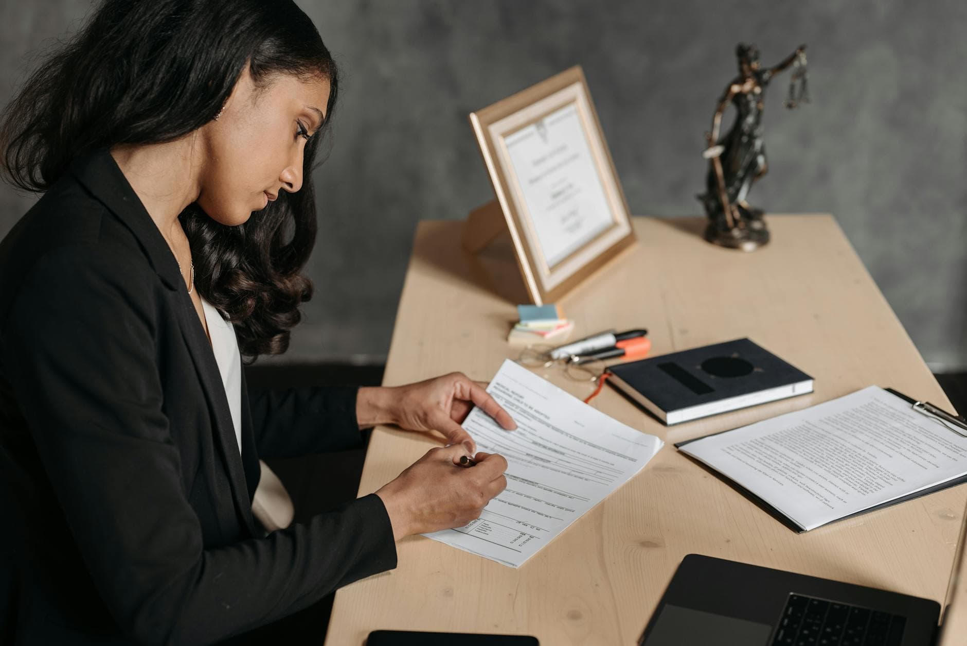 A lawyer's drafted document being prepared for notarization at an Ottawa office, illustrating the boundary between legal advice and notarial execution in apostille files