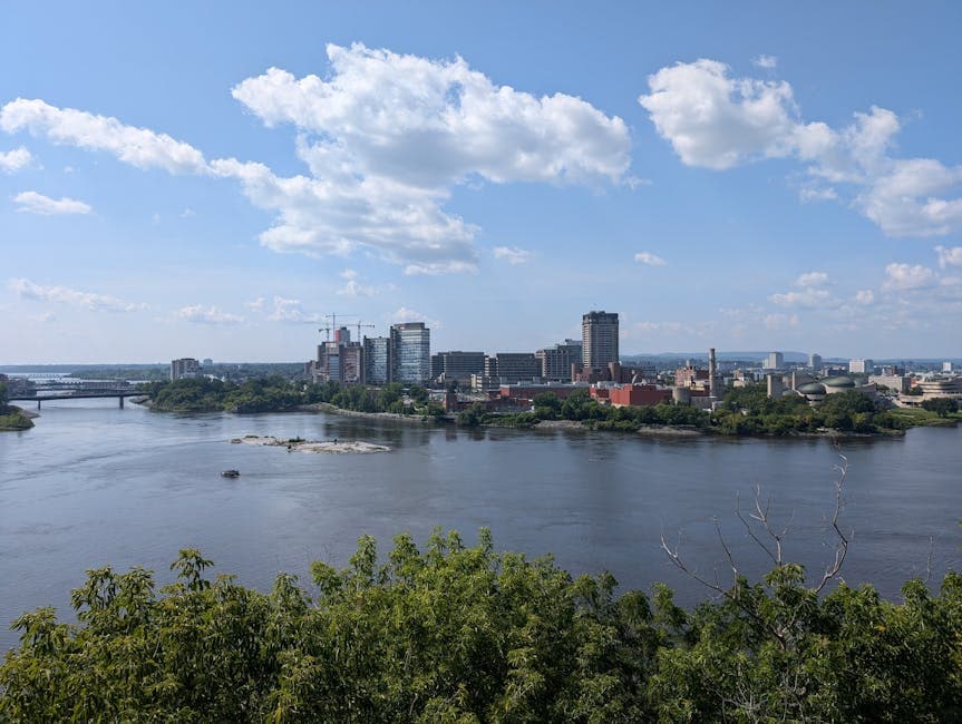Map view of Ottawa and Gatineau with the Ottawa River and the Portage and Macdonald-Cartier bridges marked, illustrating cross-river notary scenarios