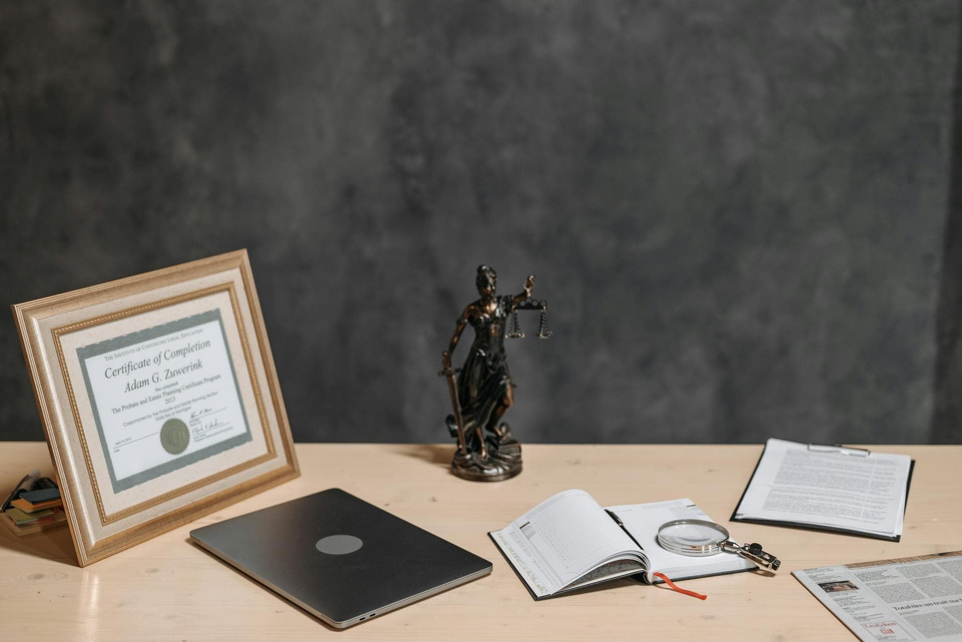 A pair of provincial teaching certificates and a passport laid out on a notary's desk in Ottawa, ready for certified true copies before a labour-mobility application