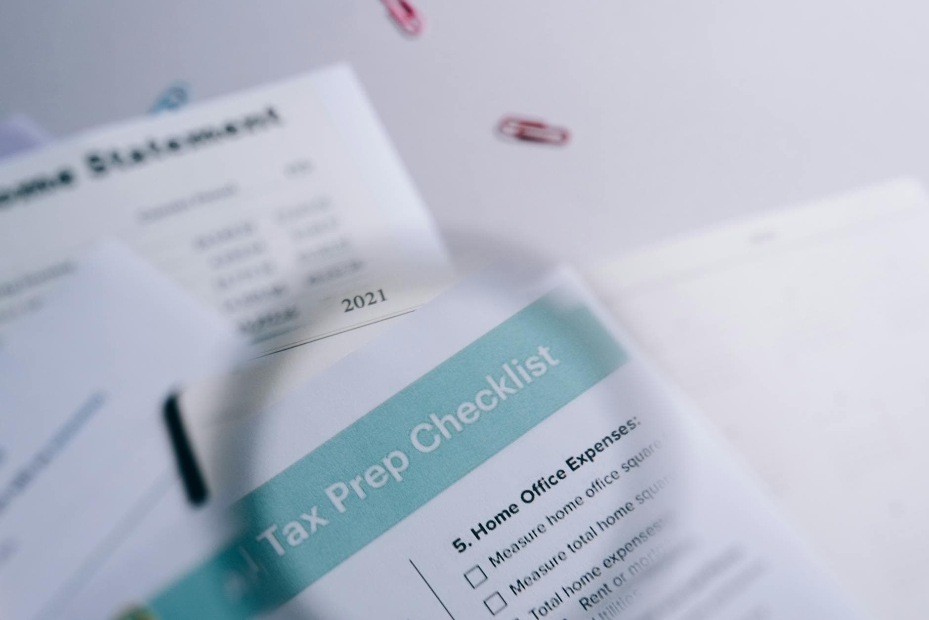 Common mistakes checklist on an Ottawa notary's desk — letterhead, dated correctly, signer present, photo ID — beside an unsigned employment letter