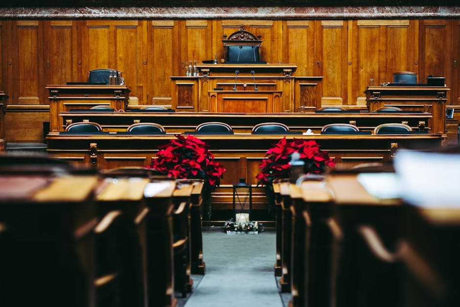 Justice of the peace bench in an empty Ontario courtroom, illustrating the judicial setting where JPs work in Ontario