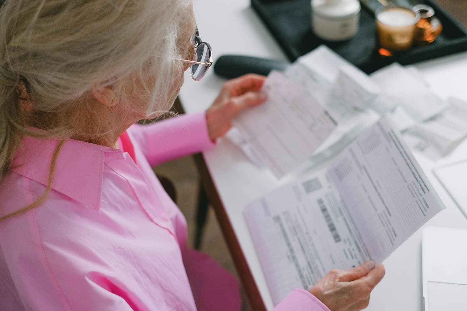 A power of attorney for personal care document on an Ottawa kitchen table, with a pen and a coffee cup, the grantor reviewing the special instructions section
