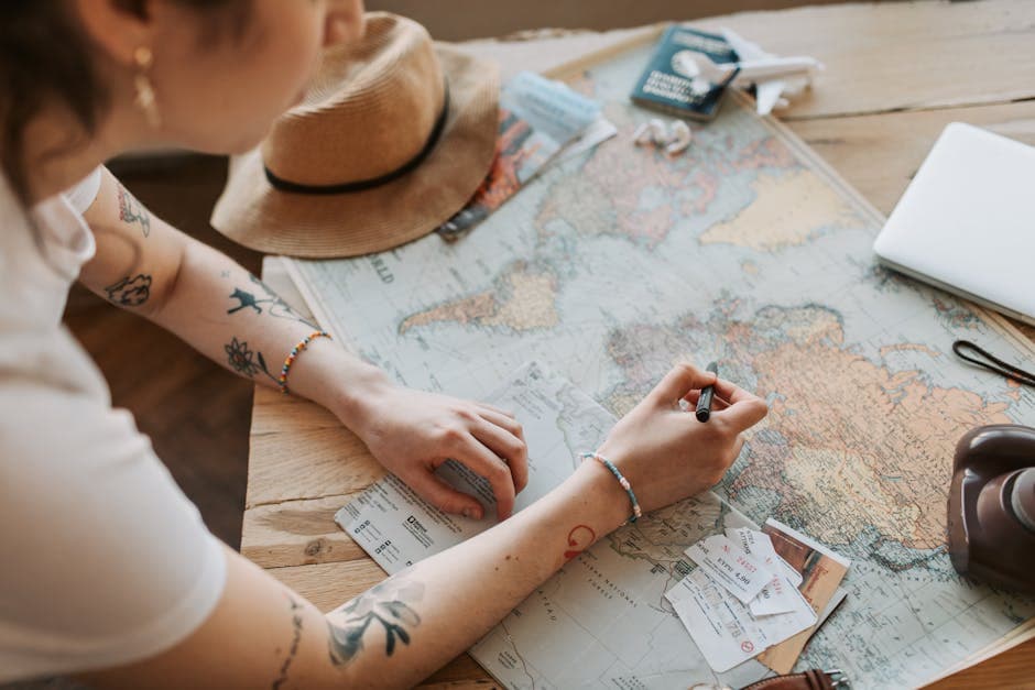 A Canadian passport and a printed travel consent letter for a minor on a desk with a pen, ready to be notarized